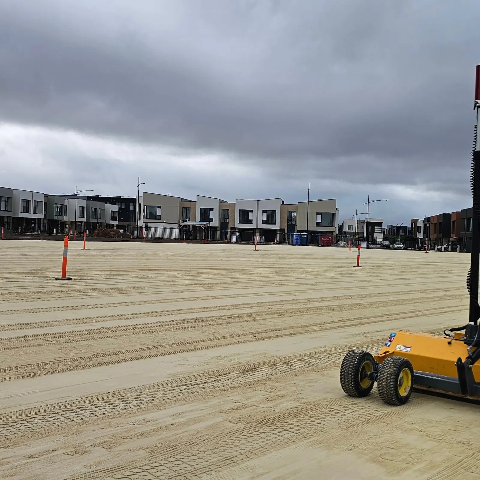 Large laser-levelled sand base prepared for a synthetic sports field