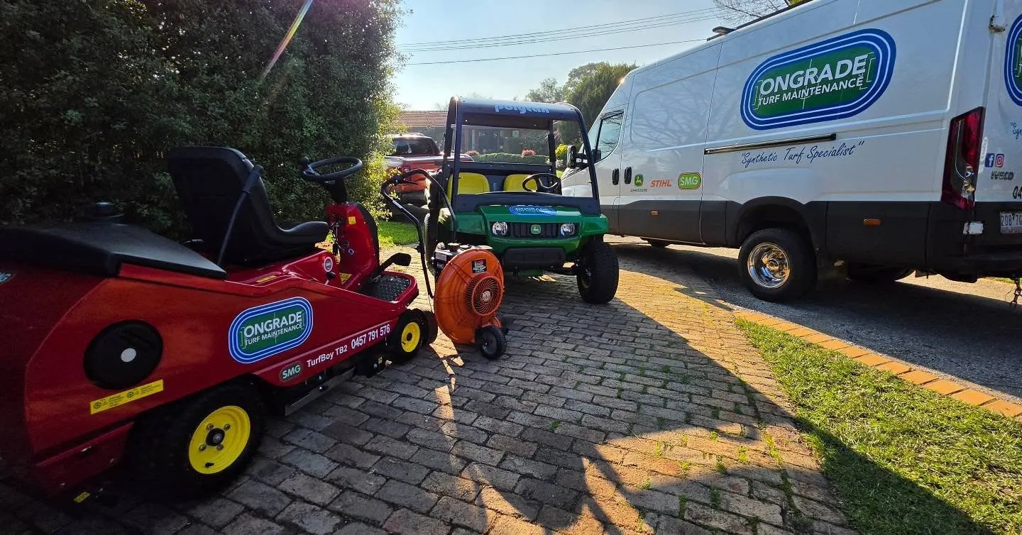 Ongrade Turf Maintenance branded van with sweeper and blower equipment
